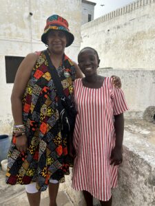 Mothers of fraternal twin children: From left, Blog Author Ann aka Ama (born on Saturday)  and "Abena" (born on Tuesday) at Elmina (Ghana) Slave Dungeon